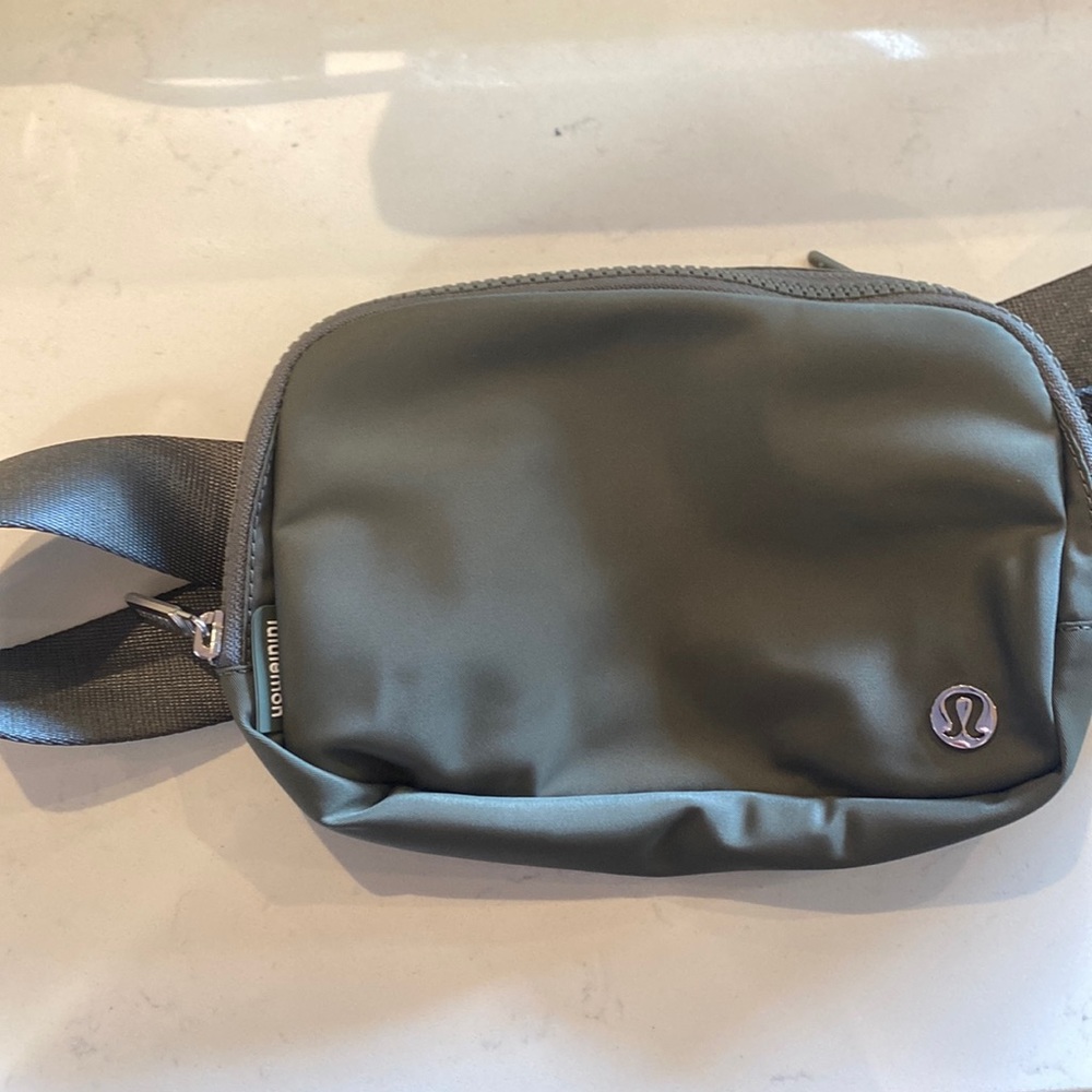 never worn grey lululemon belt bag